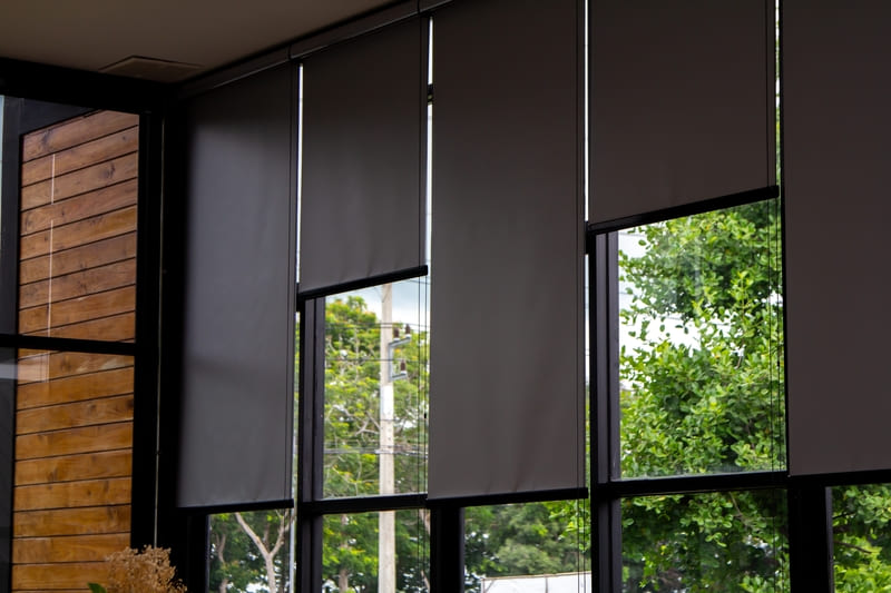 Windows with black curtains – JRSIT